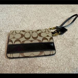 Coach brown signature wristlet with leather accent